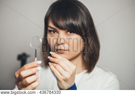 Ophthalmologist Holds Lenses In His Hands To Check His Vision. Vision Correction In Clinic. Vision T