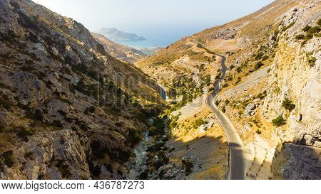 Empty Rural Road Through The Beautiful Gorge Of Kourtaliotikos In Crete Island In Greece.