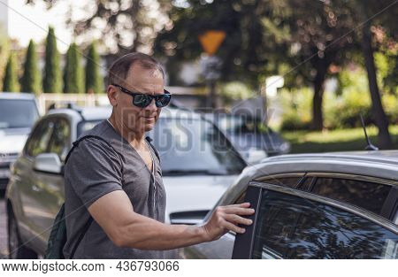 Handsome Mature Man 50 Years Old, Stands Near The Car, Man Portrait On The Street