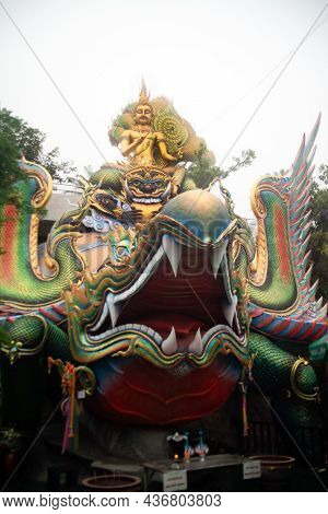 Sakon Nakhon,thailand - October 1 , 2020 : A Large Golden Seated Buddha Statue Outdoors, Sheltered B