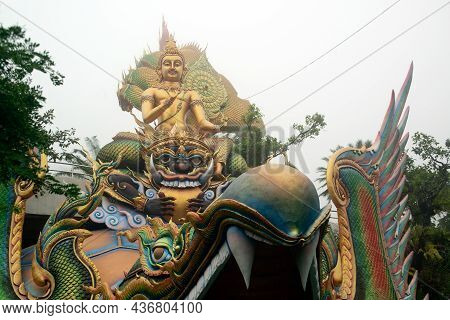 Sakon Nakhon,thailand - October 1 , 2020 : A Large Golden Seated Buddha Statue Outdoors, Sheltered B