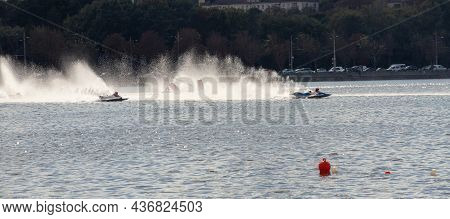 Sport. Motor Boat Races. Speed, Water Sports. Competition On The Water On A Sunny Day