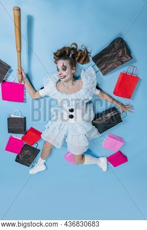 Top View Of Young Girl With Bright Make-up For Celebrating Halloween Or Day Of The Dead. Costume Of 