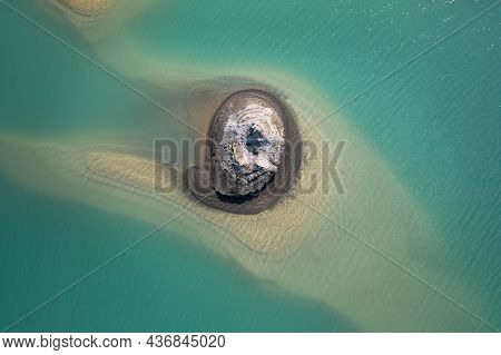 Drone View Of The Turquoise Lake Formed As A Result Of Mining Waste