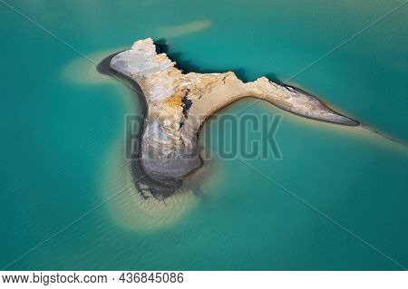 Drone View Of The Turquoise Lake Formed As A Result Of Mining Waste