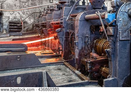 The Process Of Rolling Hot Rolled Steel In A Rolling Mill.