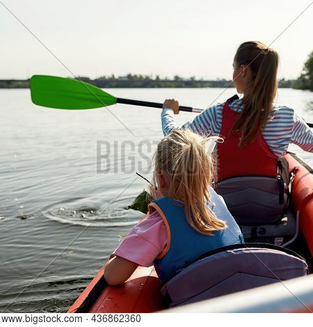 Family Floating On Kayak In Lake Or River. Concept Of Rest, Leisure And Entertainment At Nature. Ext