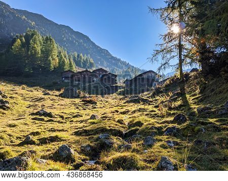Monstein. Idyllic Mountain Landscape In The Alps. Davos. Beautiful Wooden Houses, Chalets With Morni