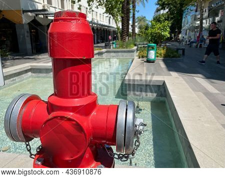 Old Red Fire Hydrant In New York City Street. Fire Hidrant For Emergency Fire Access.