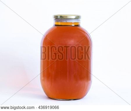 Three Liters Of Homemade Beer In A Glass Jar