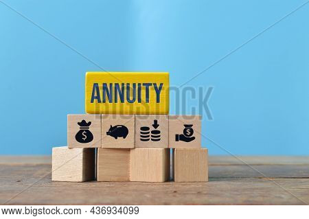 Wooden Blocks With Text Annuity And Money Symbols