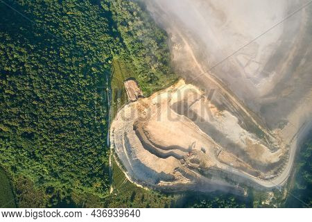 Aerial View Of Open Pit Mining Site Of Limestone Materials Extraction For Construction Industry With