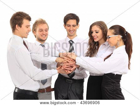 business team putting their hands on top of each other