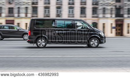 Moscow, Russia - July 2021: Volkswagen Transporter In Motion On The City Road On High Speed. Black L