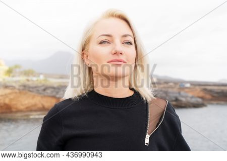 Blond Relaxed Girl Breathing And Calming Down, Looking Into The Future Concept, Mask And Pandemia Fr