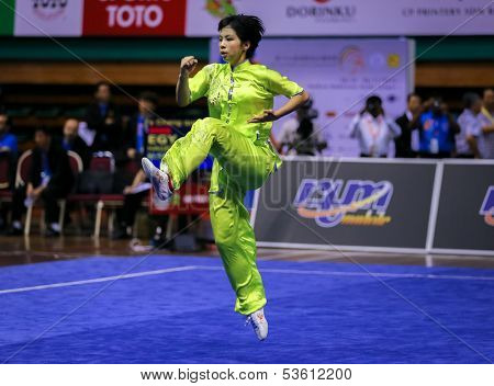 KUALA LUMPUR - NOV 03: Hager Elsayed of Egypt shows her fighting style in the 'changquan compulsory' event at the 12th World Wushu Championship on November 03, 2013 in Kuala Lumpur, Malaysia.
