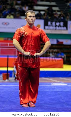 KUALA LUMPUR - NOV 03: Russia's Ilyas Khusnutdinov shows his fighting style in the 'changquan compulsory' event at the 12th World Wushu Championship on November 03, 2013 in Kuala Lumpur, Malaysia.