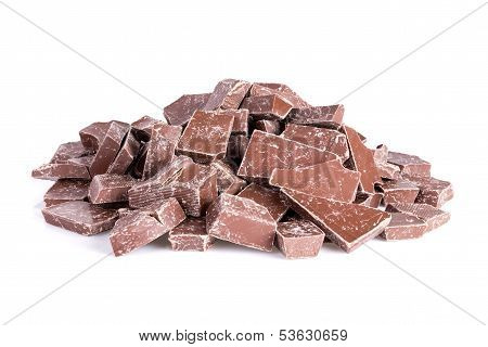 Pile Of Chocolate Pieces Over White