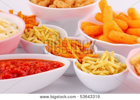 Potato, Corn And Wheat Chips In Bowls