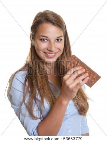 Young woman with chocolate her kitchen