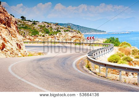 Road In The Mountains Turns Sharply Over The Mountain