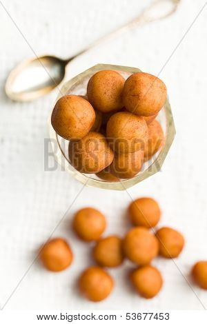 the marzipan balls in the tea glass