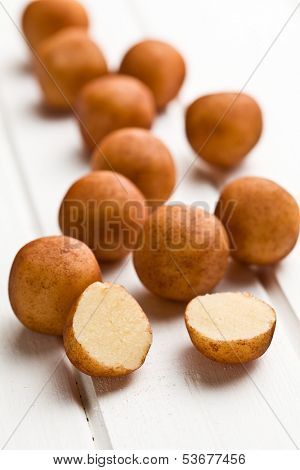 marzipan balls on white kitchen table