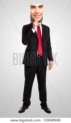 Businessman hiding behind another face
