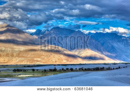 High dynamic range image valley in Himalayas. with sand dunes. Hunder, Nubra valley, Ladakh, India