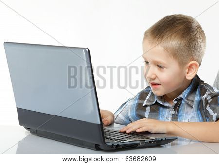 Computer Addiction Child With Laptop Notebook