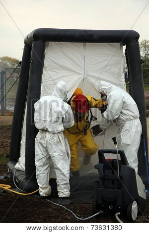 The person in chemical protection suit