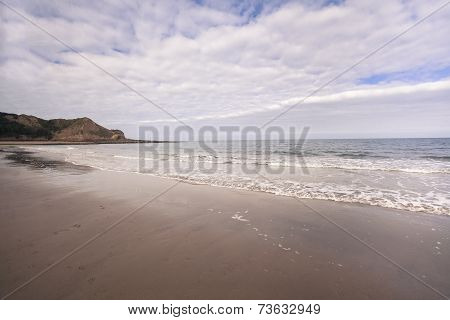 Breaking Waves On Sandy Beach Seascape
