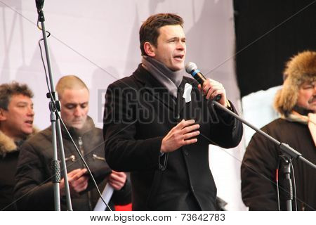 Politician Ilya Yashin on the stage of opposition rally