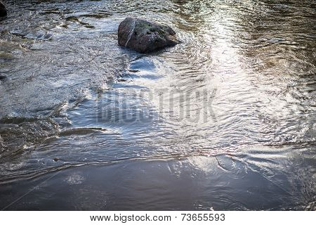Rock in water