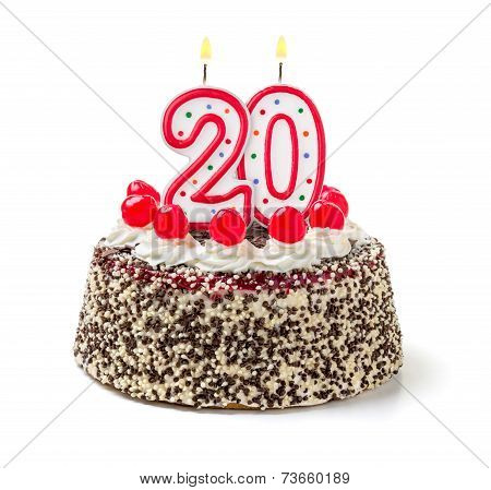 Birthday cake with burning candle number 20