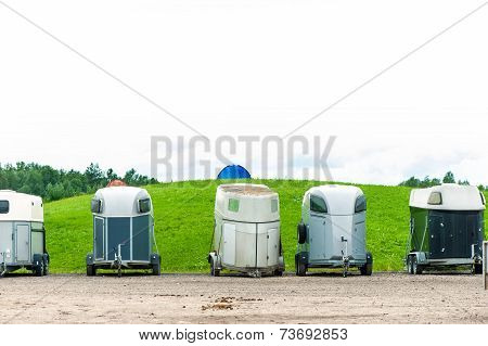 Many Horse Trailers In The Green Park Outdoors.