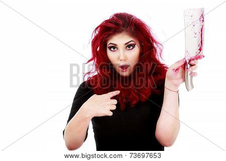 redhead woman with a bloody hatchet in hand