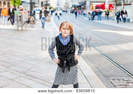 Fashion portrait of a cute little girl