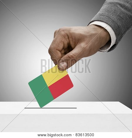 Black Male Holding Flag. Voting Concept - Benin