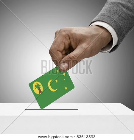 Black Male Holding Flag. Voting Concept - Cocos (keeling) Islands