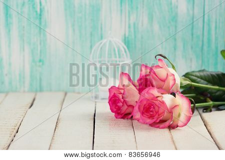 Flowers On Wooden Background.