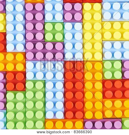 Surface covered with toy bricks