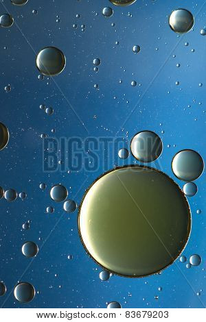 Blue and gold oil and water abstract