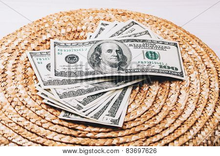 Money on Wicker surface