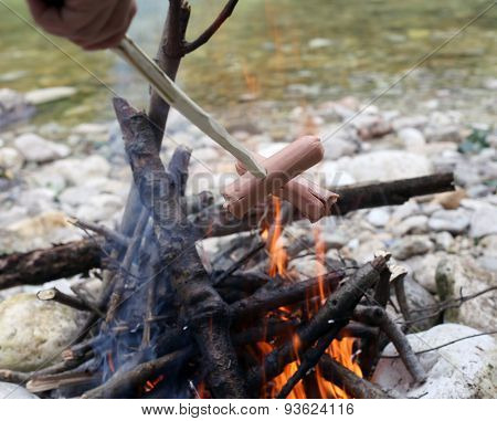 Roasted Sausage Cooked In Fire During The Summer Camp