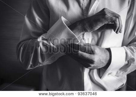 Groom prepares for wedding