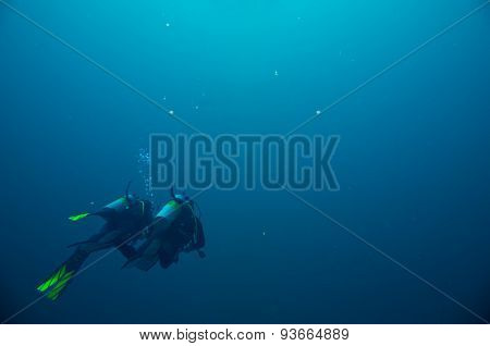 Couple of scuba divers set out on an underwater adventure. Red Sea