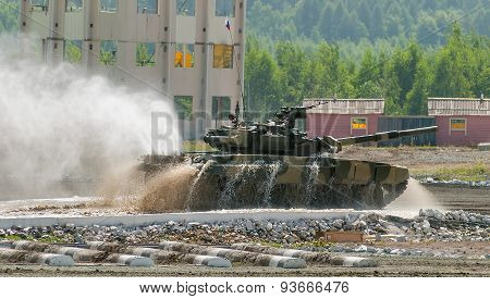 Tank T-80 moves after water ford