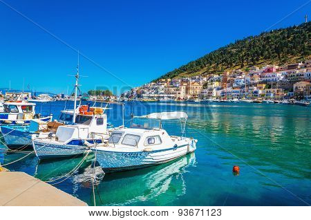 Small boats in cozy port of Pothia, Greece