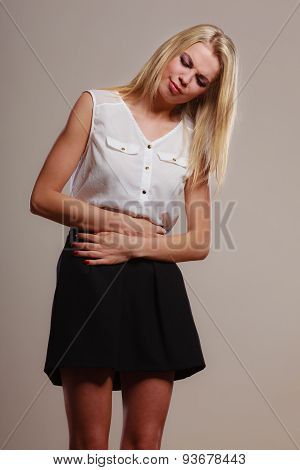 Girl Suffering From Stomach Pain